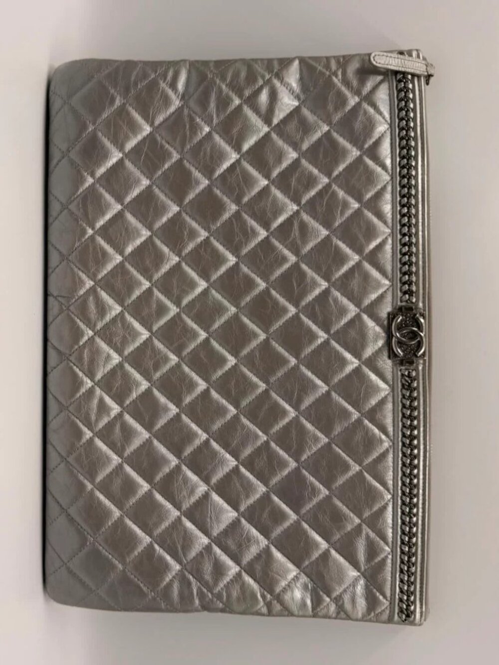 Authentic pre-owned Chanel Boy O Case Large Clutch in stunning Silver Metallic q